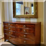 F36. Mahogany chest of 8 drawers. 34”h x 58”w x 21”d 